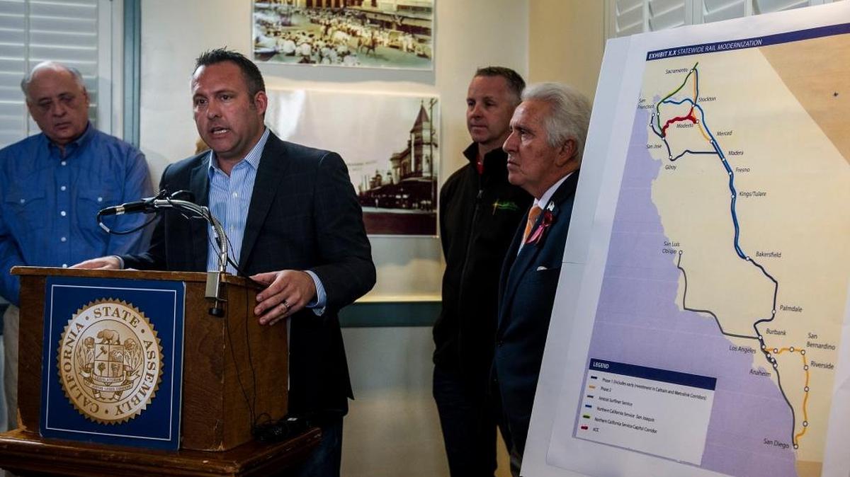 Assemblyman Adam Gray, D-Merced, with Rep. Jim Costa, right, and state Sen. Anthony Cannella, rear, announces plans to include Merced as one of the Valley stations along the proposed high-speed rail route last April. He sees it as a good way to generate jobs and help clean the air.