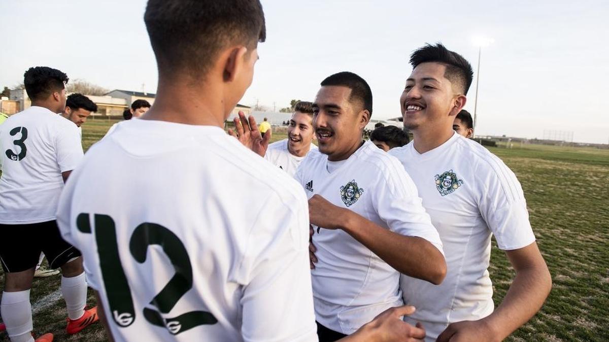 Le Grand players celebrate a 4-0 victory over Millennium in a CIF Northern California Regional Division IV playoff match against Millennium at Le Grand High School in Le Grand, Calif, on Tuesday, March 6, 2018.
