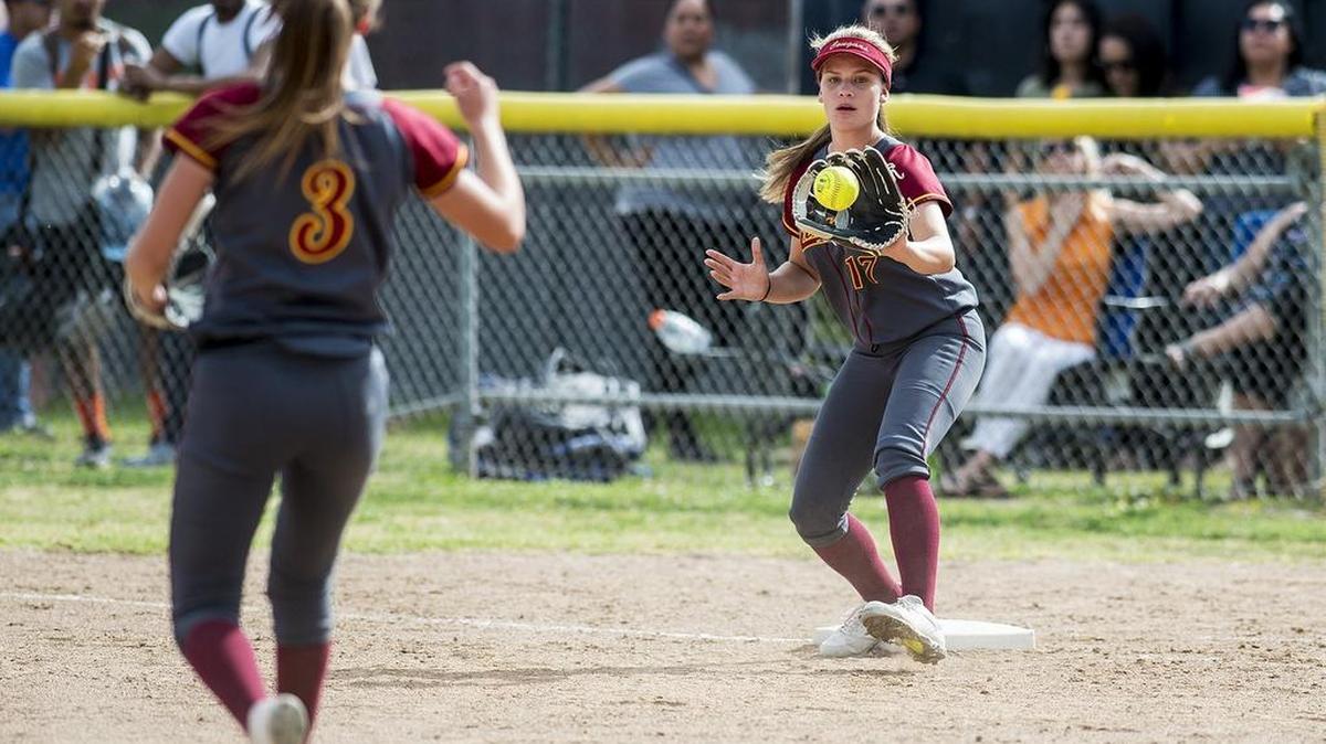 Golden Valley junior Michaela Key (17) catches a throw to first base for an out during a game against Merced at Merced High School in Merced, Calif., on Tuesday, May 8, 2018. The Cougars beat the Bears 6-3.