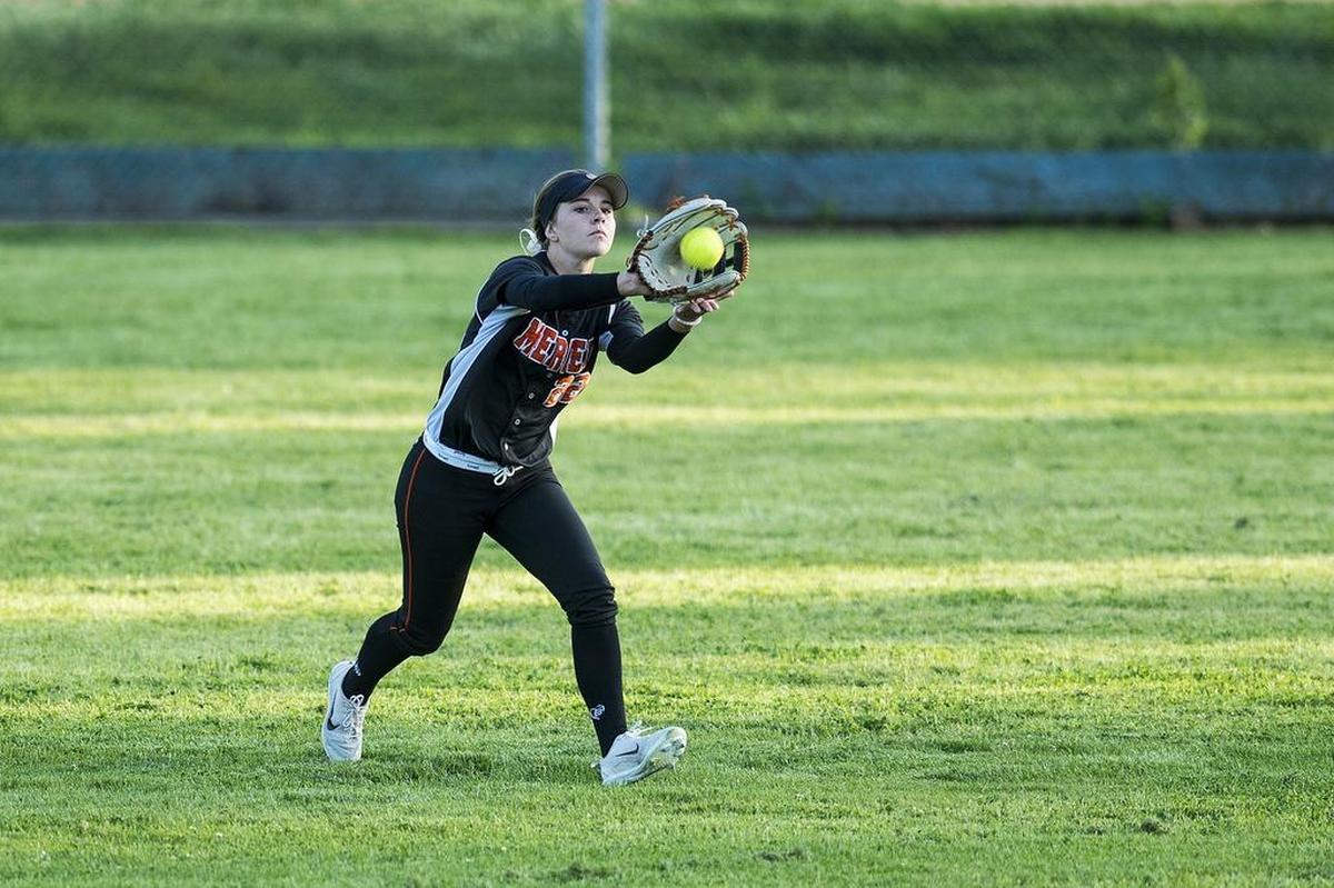 Merced junior Ashlynn Chatham (22) catches a fly ball for an out in center field during a game against Golden Valley at Joe Herb Park in Merced Calif., on Thursday, April 12, 2018. The Cougars beat the Bears 3-2.