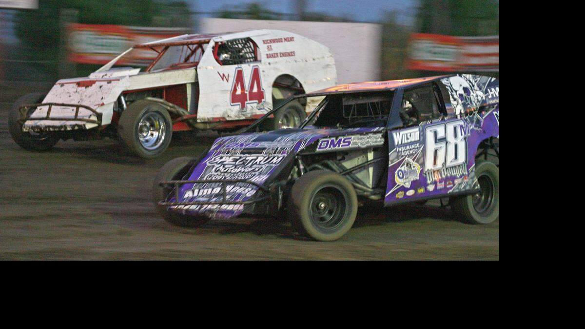 John MacDougall (68) has the inside battling with Paul Stone (44) at Merced Speedway. MacDougall, the Modified points leader, says the track is tough and challenging.