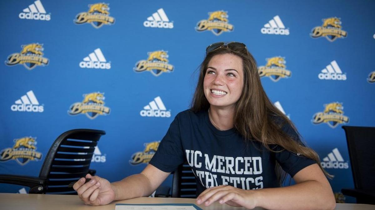 Buhach Colony High School graduate Jessica Pinasco, signs her letter of intent to play volleyball for the University of California, Merced on the UC Merced campus in Merced, Calif., on Tuesday, June 27, 2017.