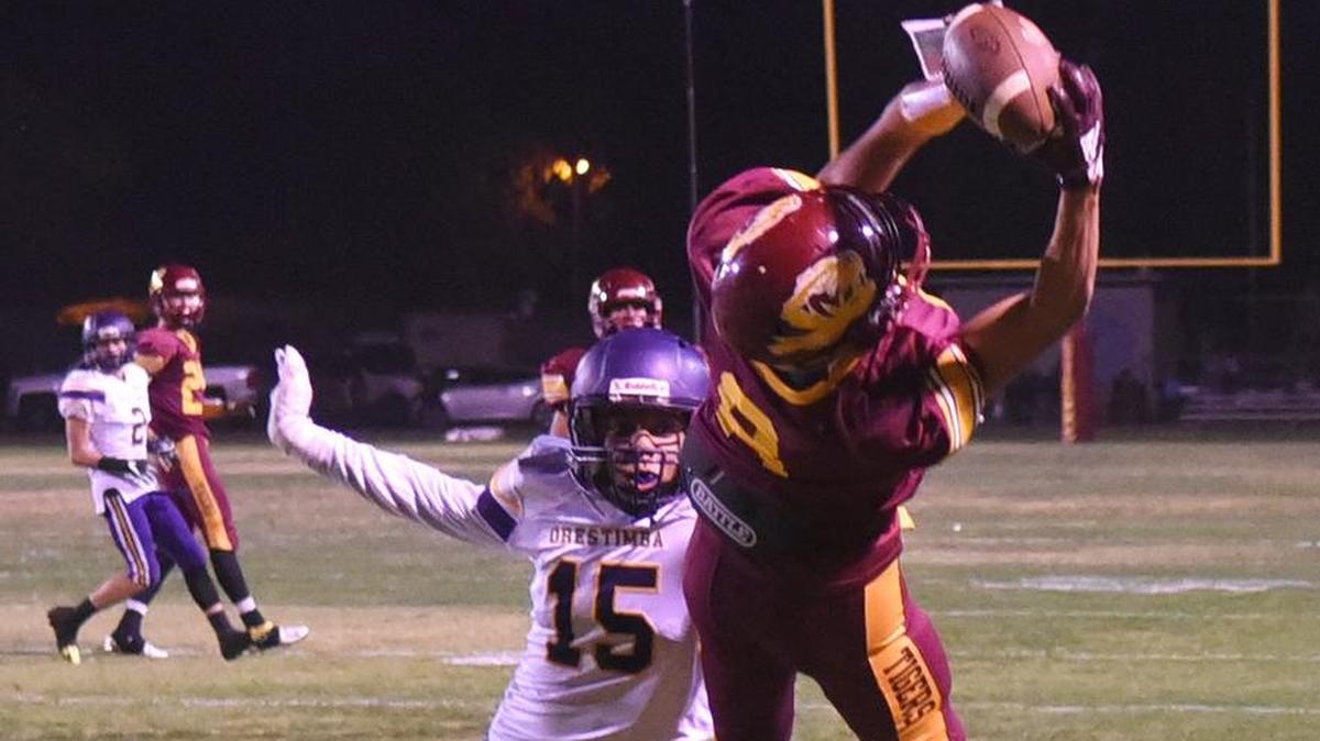 Los Banos receiver, Landon Ramos catches a pass in the fourth quarter against Orestimba High School, but lands with a foot on the line Friday night, Nov. 2, 2018 at Loftin Stadium in Los Banos.