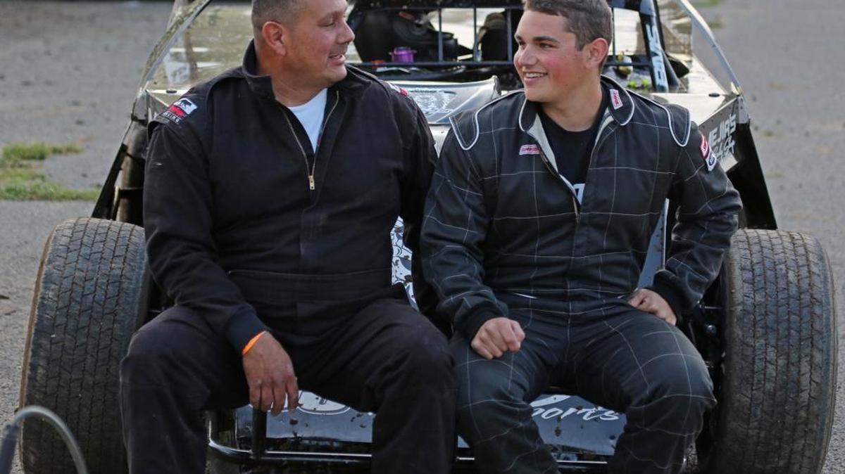 (041517 Merced, CA) Father Knows Best - Mike Villanueva, left, talks to his son Justin, a rookie in the IMCA Modified division this year at Merced Speedway . Saturday, April 15, 2017. Staff photo by Mike Adaskaveg.