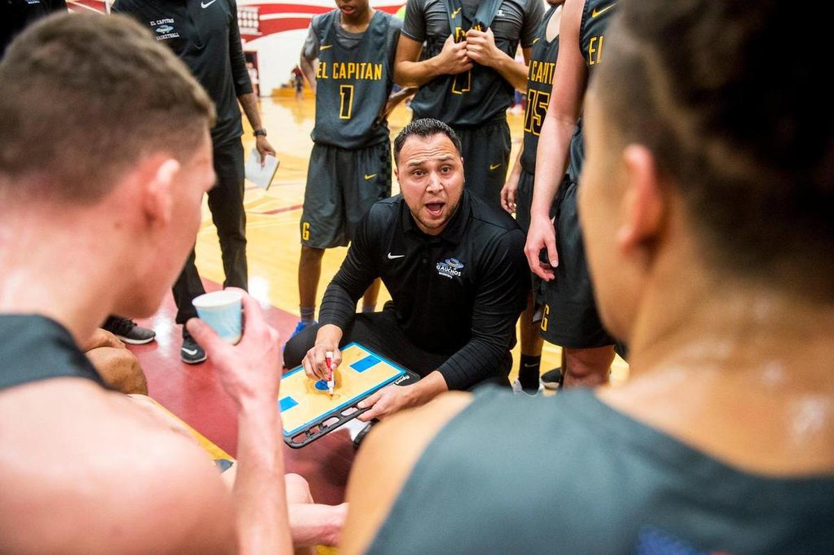 El Capitan head coach Adrian Hurtado speaks to his players during a game against Golden Valley at Golden Valley High School in Merced, Calif., on Wednesday, Jan. 23, 2019.