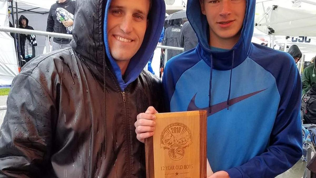 Merced Skimmers standout Rob Carpenter, pictured here with Skimmers coach Ryan Randall, was named the 12 year old Swimmer of the Year for Central California Swimming.