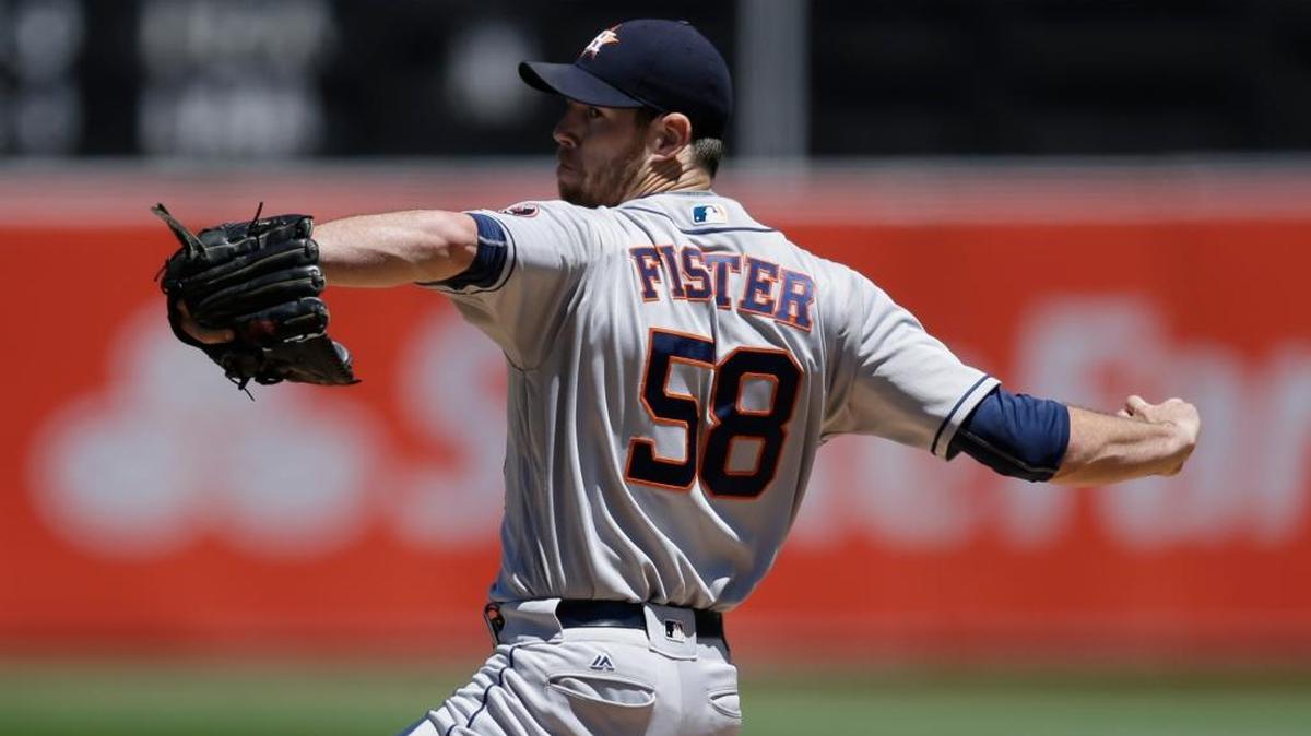 Houston Astros pitcher Doug Fister works against the Oakland Athletics in the first inning of a baseball game Wednesday, July 20, 2016, in Oakland, Calif. Fister threw seven solid innings and earned the victory in a 7-0 win.