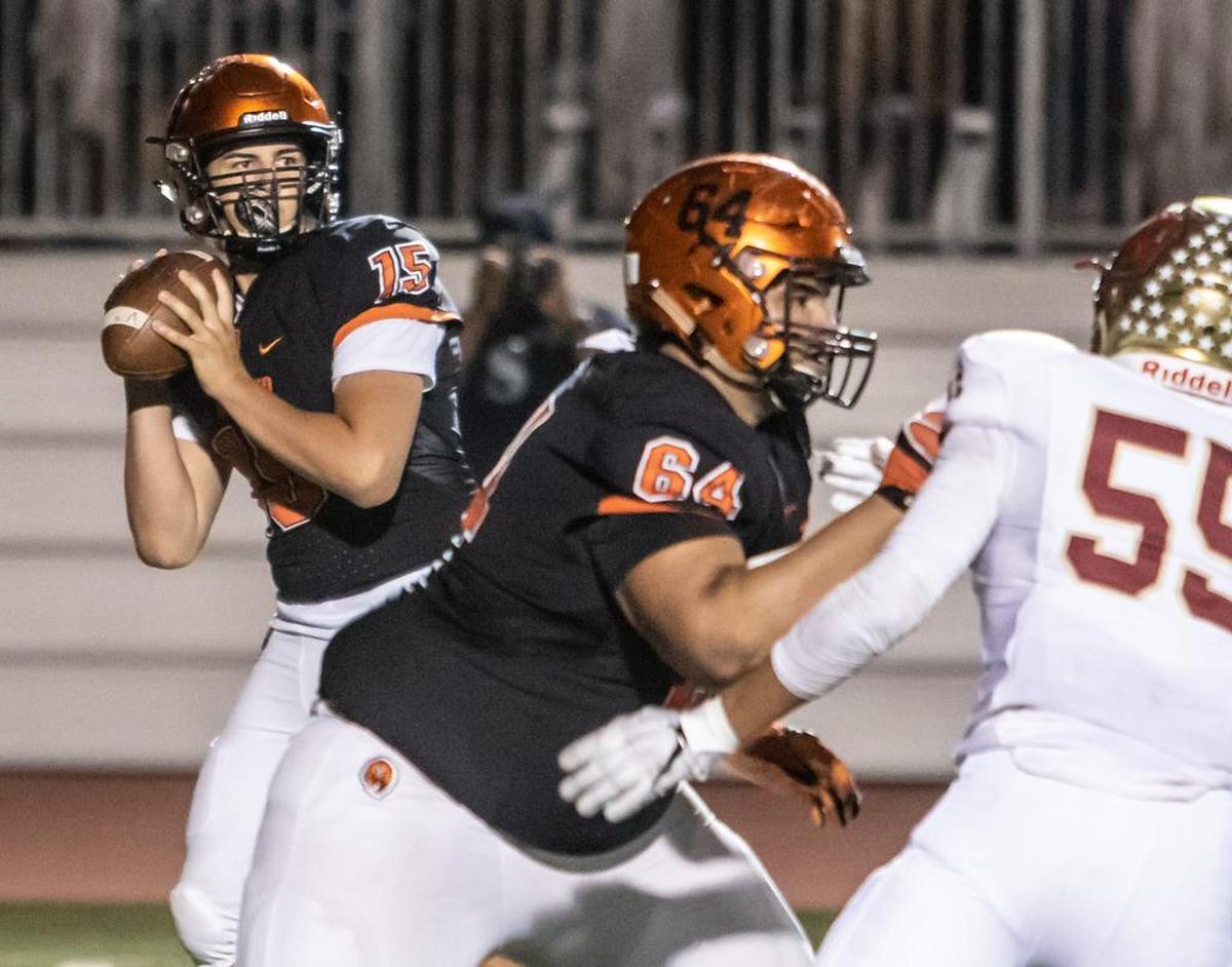 Merced quarterback Junior Garcia delivers a pass during the Bears’ 41-7 win over Golden Valley in the 25th annual Battle for the Mayor’s Cup on Friday, Oct. 26, 2018 at Veterans Stadium in Merced, Calif.