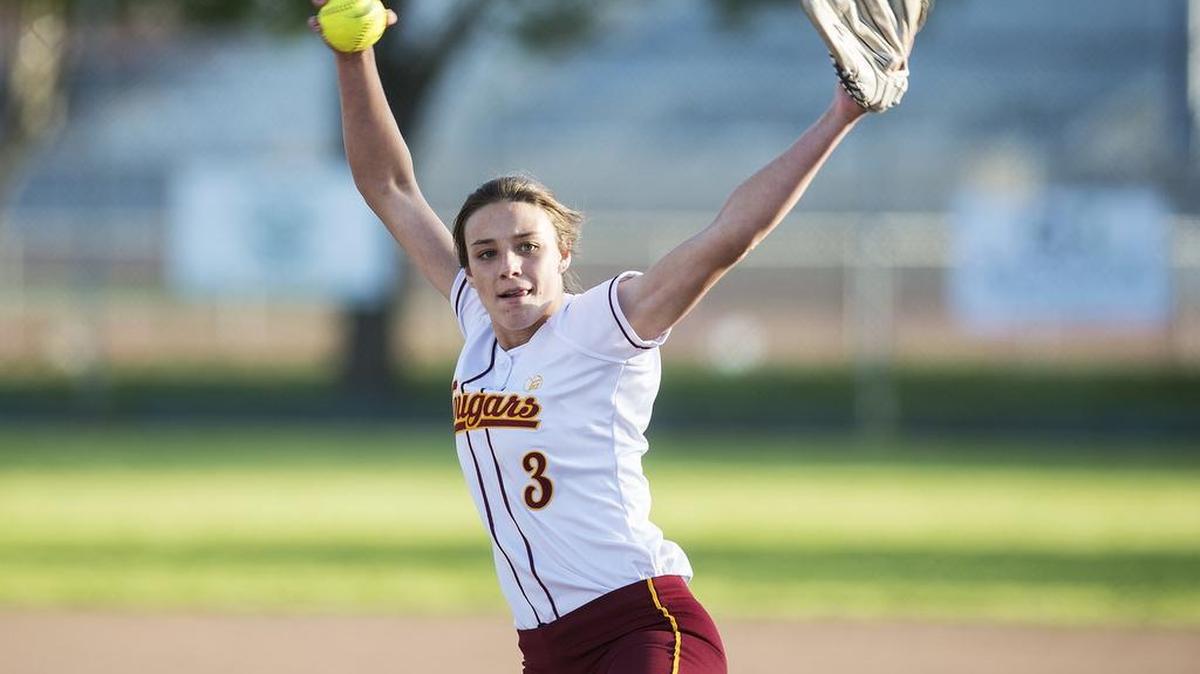 Golden Valley junior pitcher Marissa Bertuccio (3) winds up to deliver a pitch during a game against Merced at Joe Herb Park in Merced Calif., on Thursday, April 12, 2018. The Cougars beat the Bears 3-2.