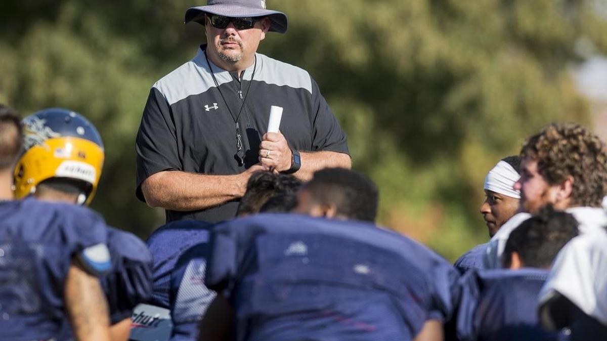 Merced College head football coach Bob Casey, speaks to his players at the end of practice at Merced College in Merced, Calif., on Thursday, Oct. 12, 2017.