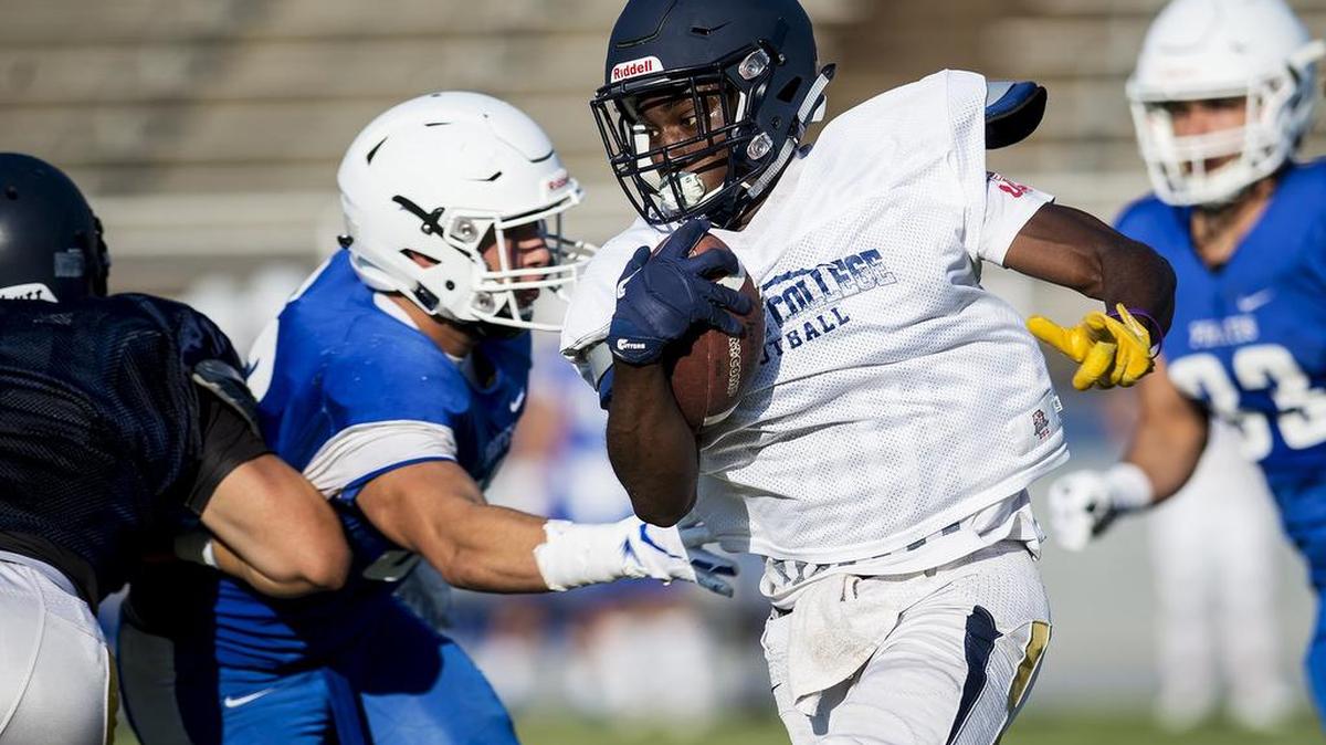 Merced College’s Elijah Macklin returns the opening kickoff during a scrimmage against Modesto Junior College at Stadium ’76 in Merced, Calif., on Wednesday, Aug. 22, 2018.