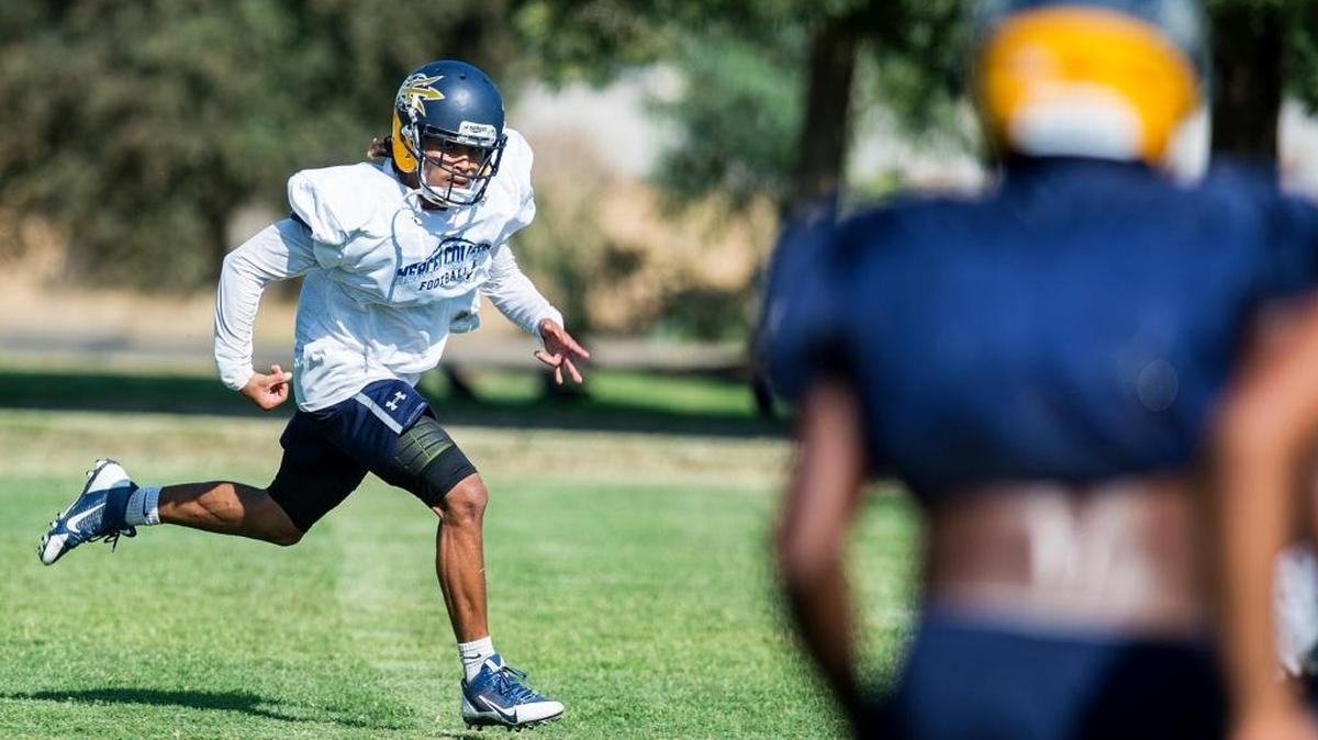 Merced College receiver Nick Cook shown here earlier this season in practice caught four touchdowns in the Blue Devils’ 34-27 loss to Monterey Peninsula on Saturday.