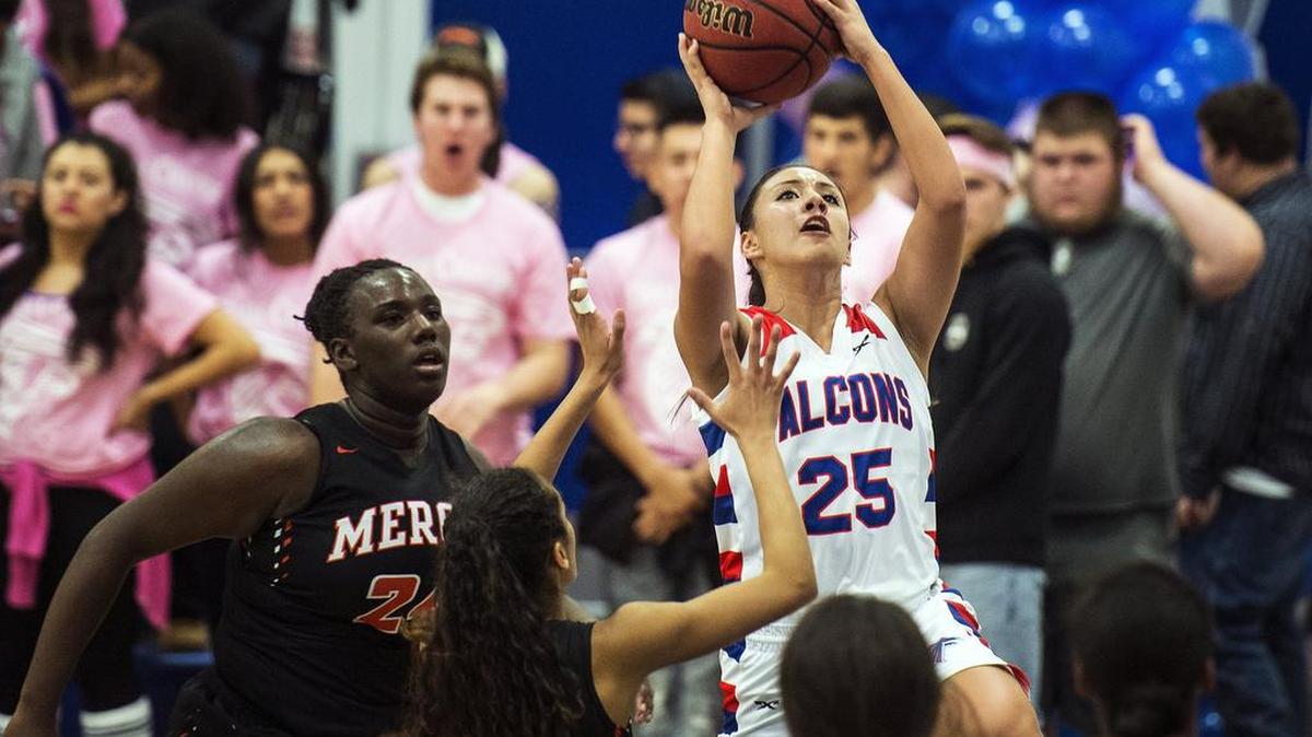 Atwater junior Alondra Ponce (25) attempts a layup during a game against Merced at Atwater High School in Atwater, Calif., Thursday, Feb. 4, 2016. The Falcons beat the Bears 65-57 in overtime.