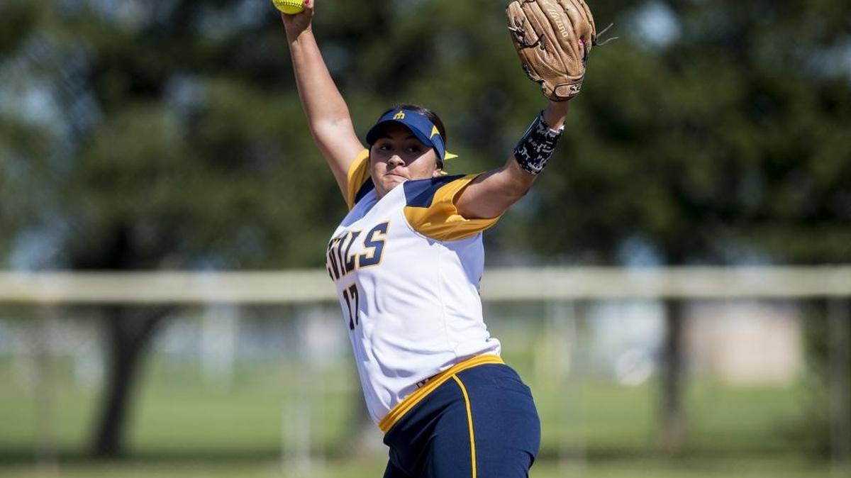 Merced College sophomore pitcher Brianna Lopez (17) delivers a pitch during the first game of a doubleheader against Cerro Coso Community College in Merced, Calif., on Thursday, March 9, 2017. The Blue Devils beat the Coyotes 11-0 in five innings.