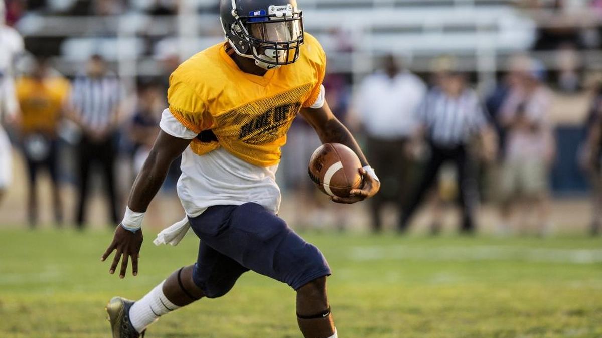 Merced College receiver Raymond Brooks scores a touchdown during a scrimmage against Modesto Junior College at Merced College in Merced, Calif., Thursday, Aug. 25, 2016.