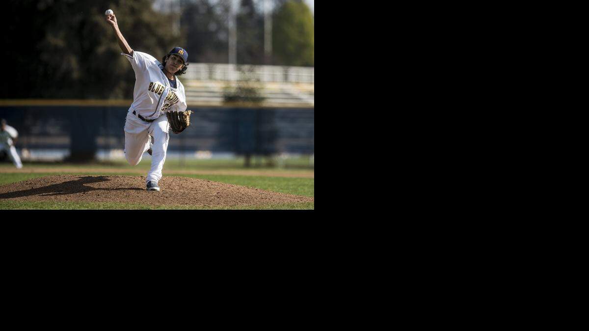 
Merced College freshman pitcher Ryan Sanchez (25) delivers a pitch during a game against College of the Sequoias at Blue Devil Diamond on the campus of Merced College in Merced, Calif., Thursday, Feb. 26, 2015. The Blue Devils beat the Giants 10-2.
