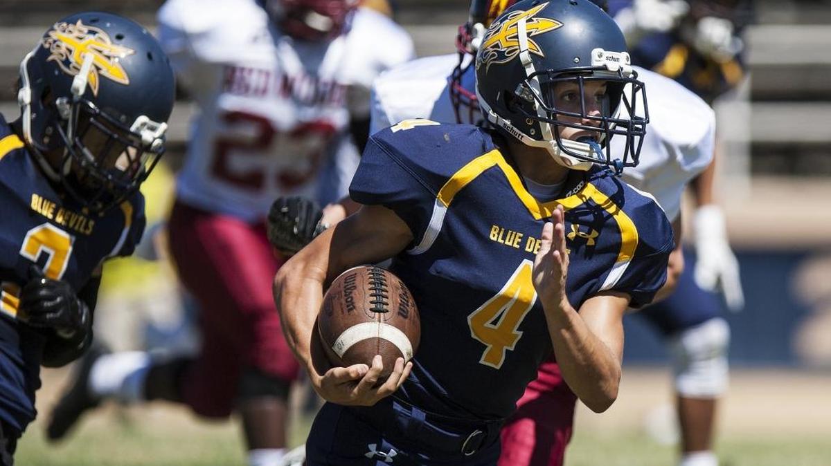 Merced College's Jackson Watts (4) returns a kick for a touchdown during a game against College of the Redwoods at Stadium '76 in Merced, Calif., Saturday, Sept. 3, 2016.