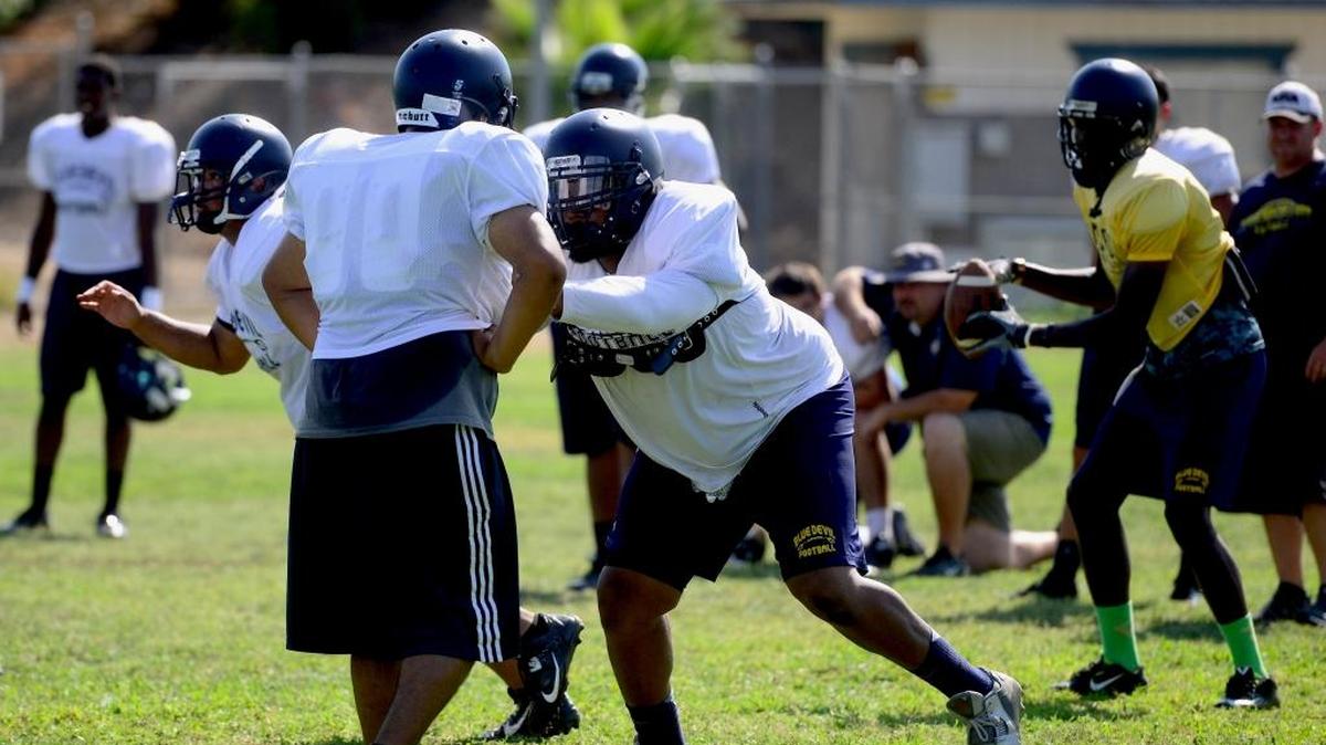 
Merced College tackle Xzavier McAllister, center, and the Blue Devil ground game hope to get a steady workload in Saturday’s season opener.
