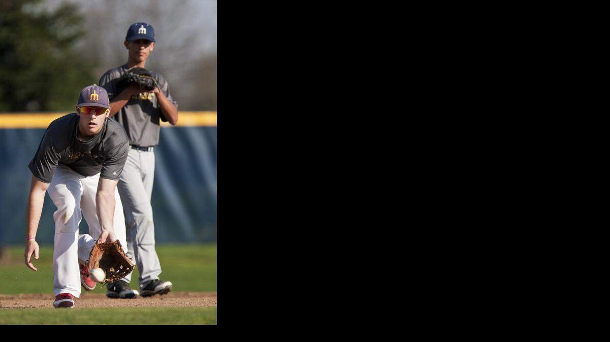 
Merced College sophomore third baseman Jimbo Pernetti fields a ground ball during practice Wednesday. Merced’s first home game of the season is Saturday at 1 p.m. against Diablo Valley College.
