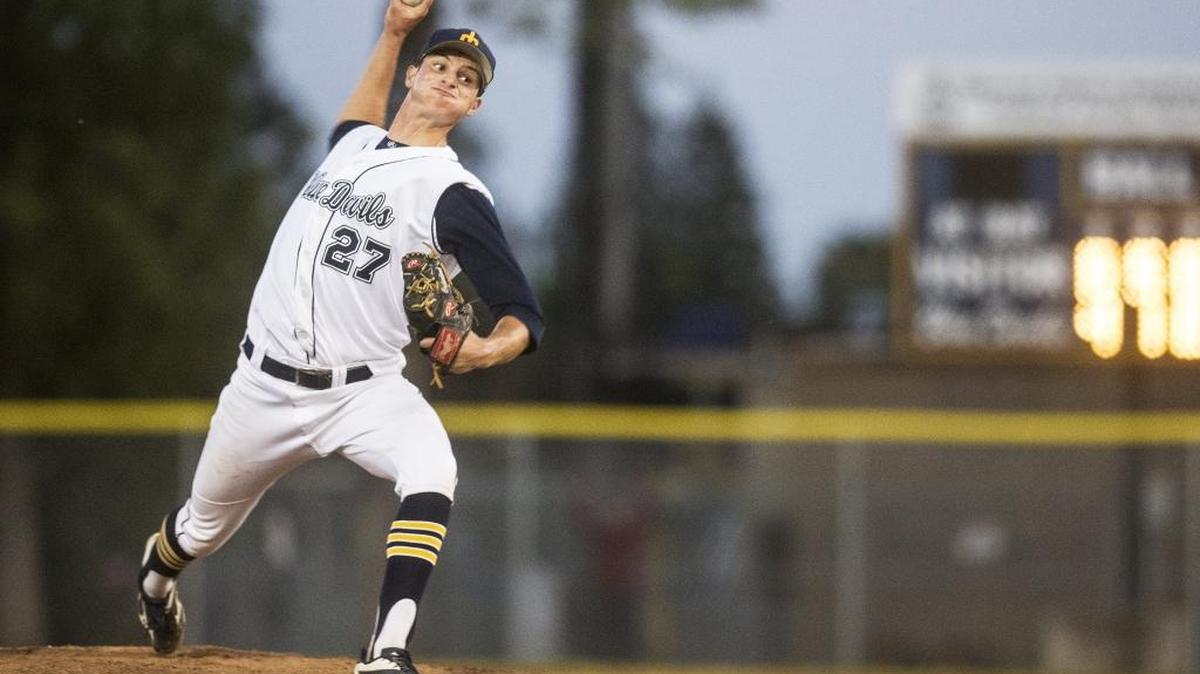 Merced College sophomore pitcher Blake Cederlind (27) throws a pitch during a game against West Hills Coalinga at Merced College in Merced, Calif., Thursday, March 31, 2016.