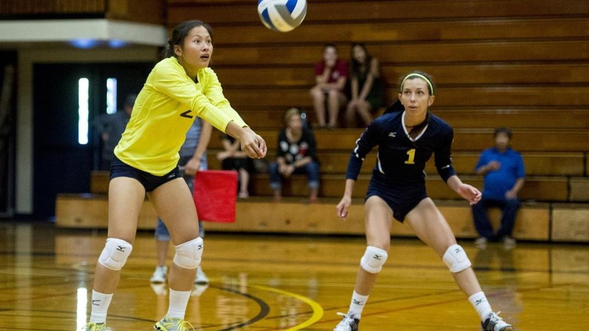 Merced College sophomore Nalee Thao (2) hits the ball during a game against College of the Siskiyous at Merced College in Merced, Calif., Wednesday, Aug. 31, 2016. The Blue Devils beat the Eagles 3-0. The Blue Devils beat the Eagles 3-0.