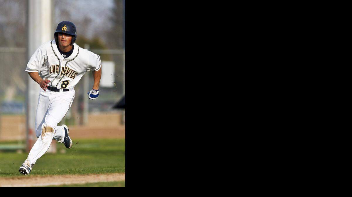 
Merced College sophomore outfielder Joseph Salmeri (8) rounds third base on his way to home plate during a game against Mission College at Blue Devil Diamond on the Campus of Merced College in Merced, Calif., Tuesday, Feb. 3, 2015. The Blue Devils beat the Saints 15-11.
