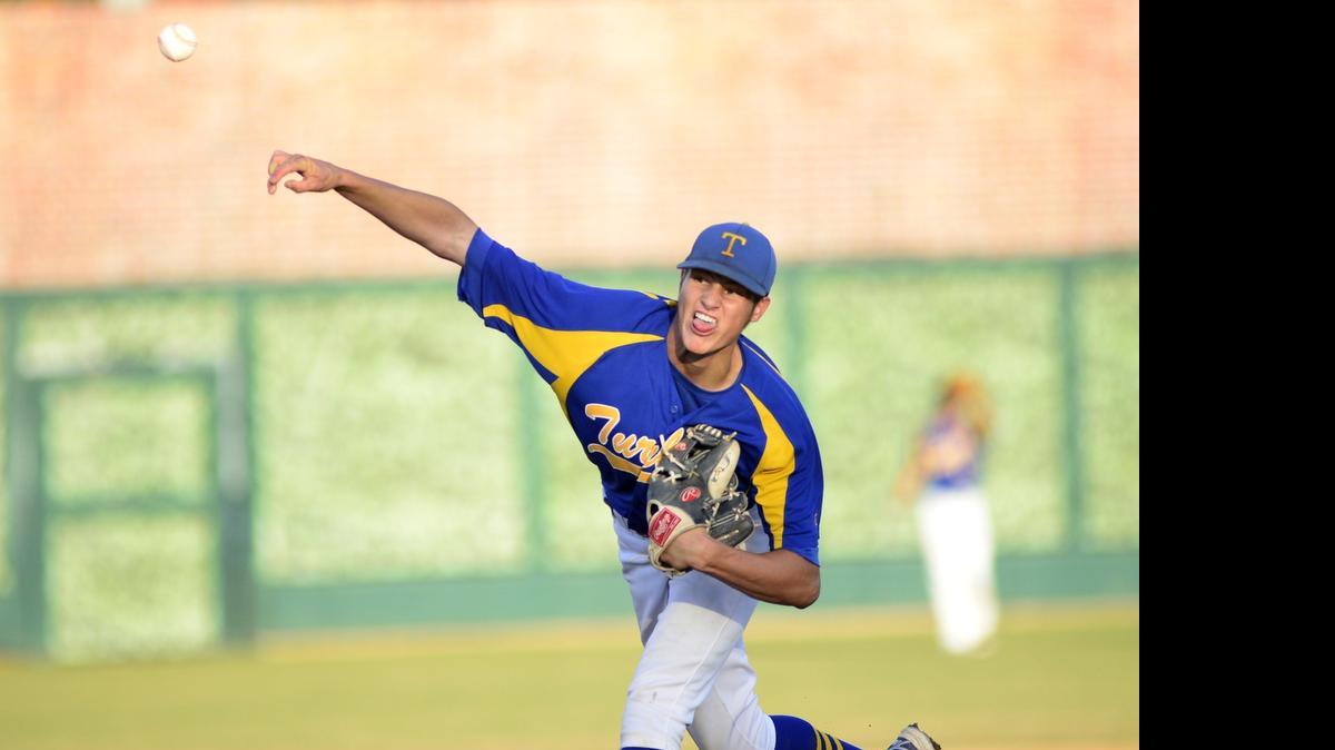 Turlock starting pitcher Blake Cederlind delivers a pitch during a game between Turlock and Tokay in the Sac-Joaquin Section Division 1 playoffs,