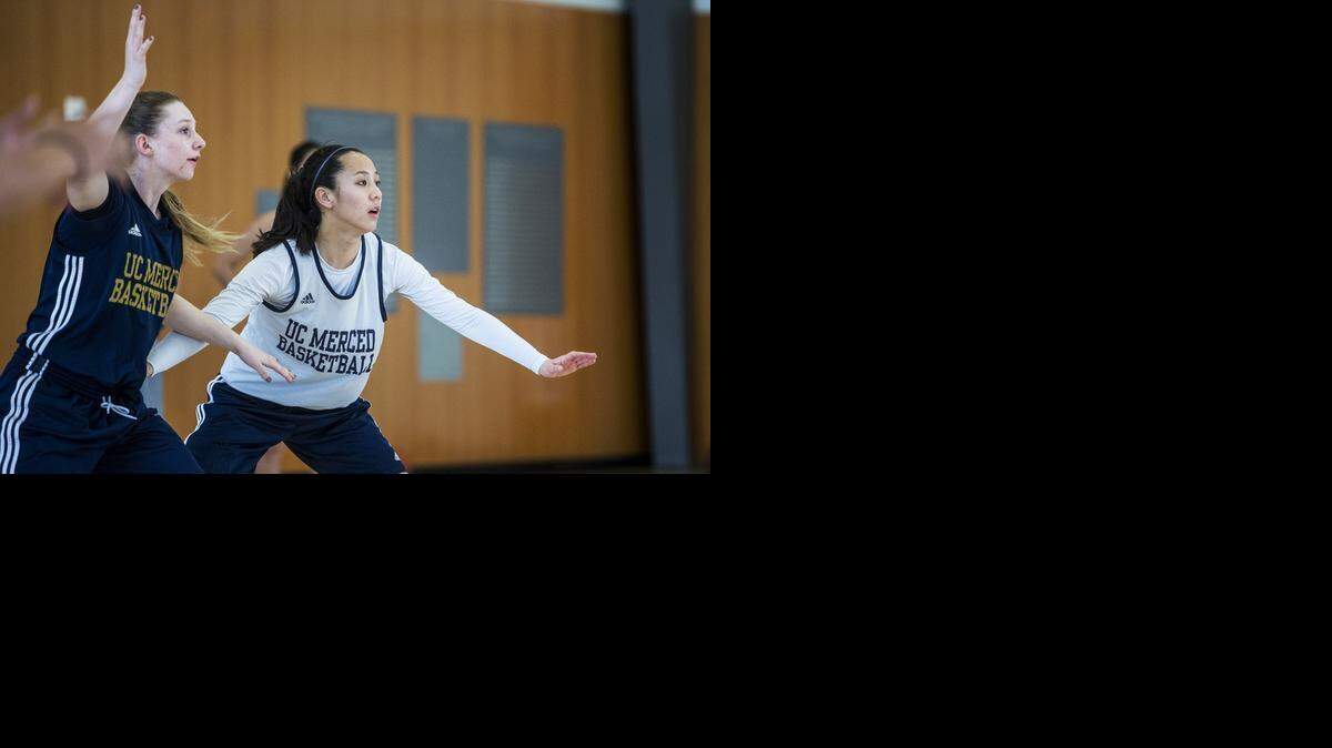 
University of California, Merced senior guard Alexis Wu, right, guards freshman teammate Allison Wisdom, left, during practice at UC Merced in Merced on Wednesday. The Bobcats will play Menlo College in the California Pacific Conference semifinals in Vallejo on Sunday.

