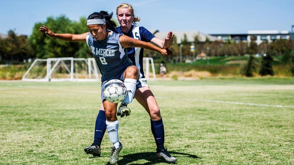 UC Merced striker Karen Lepe (8) protects the ball from an Oregon Tech defender last year. Lepe and the Bobcats hope to have a better finish to the 2016 season.