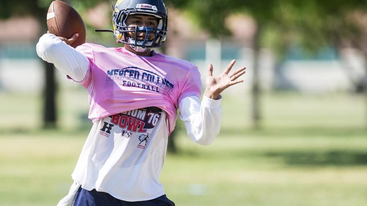 Merced College quarterback Frank Cocio throws a pass during practice at Merced College in Merced, Calif., on Thursday, Aug. 31, 2017.