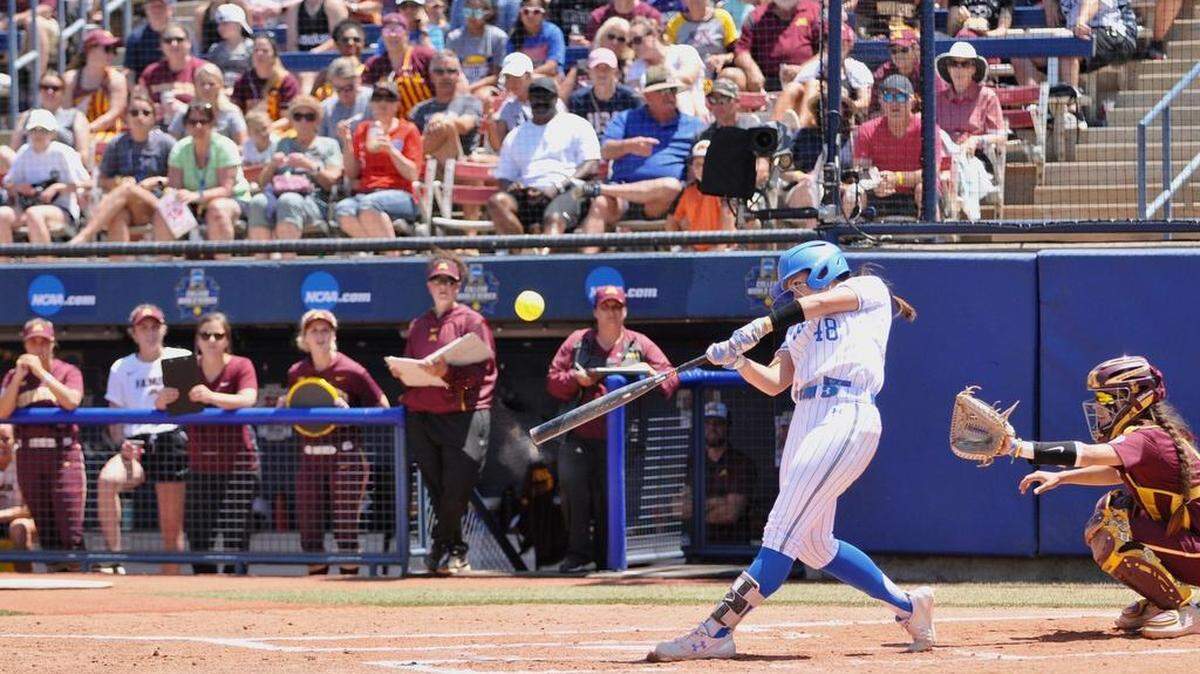 UCLA junior Madilyn “Bubba” Nickles hits a home run in her first at-bat against Minnesota on Thursday, May 30, 2019 in the College World Series in Oklahoma City.