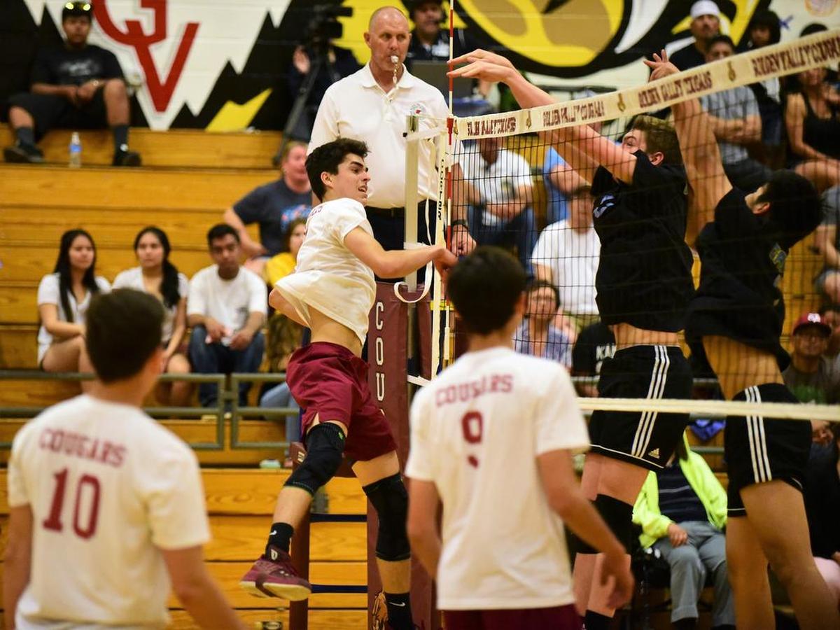 Golden Valley senior Bryan Livesay delivers the match-clinning kill as the Cougars defeated El Capitan 3-0 in the Sac-Joaquin Sections Division II playoffs on Thursday night at Cougar Arena.