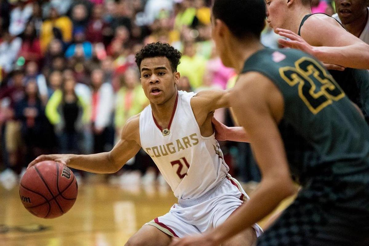Golden Valley junior Avery Townsel (21) dribbles through the paint during a game against El Capitan at Golden Valley High School in Merced, Calif., on Wednesday, Jan. 23, 2019.