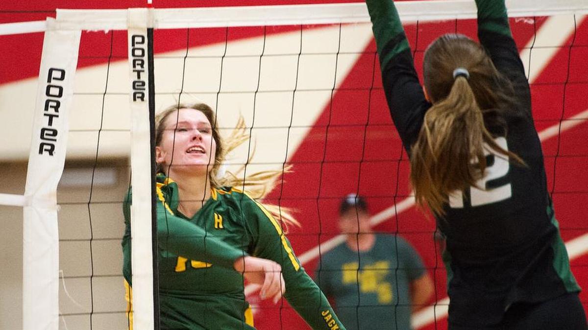 Hilmar’s Olivia Peterson spikes the ball past Colfax defender Mariah Vossoghi during the Div. IV Sac-Joaquin Section title game in Ripon, Calif., Saturday, Nov. 3, 2018. Peterson had 25 kills to help lead the Yellowjackets past Notre Dame of Salinas in five games in the second round of the NorCal Regional Playoffs on Thursday.