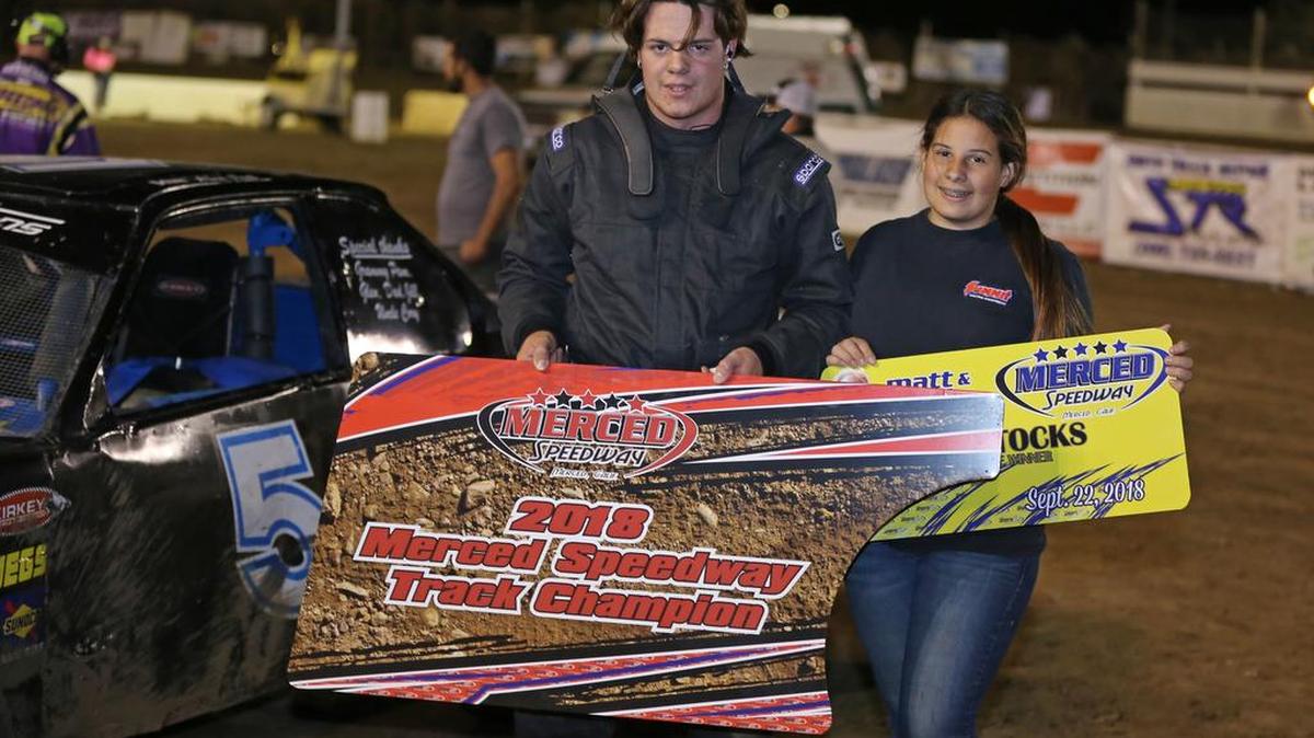 Allen Neal celebrates with his sister Shelby after winning the feature and the championship in the Mini-Stock Division at Merced Speedway.
