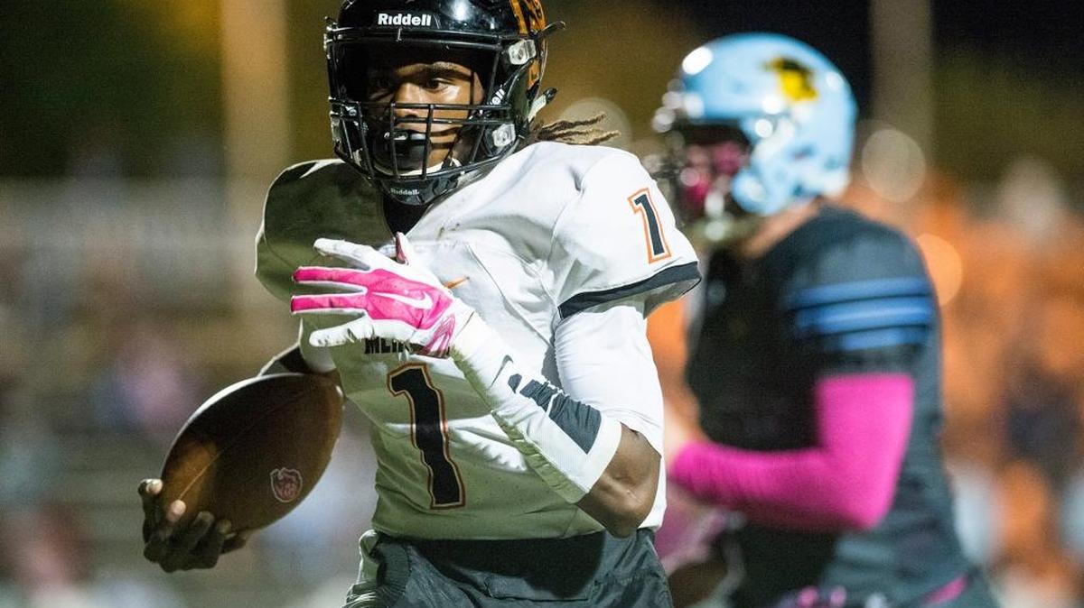 Merced junior quarterback Dhameer Warren (1) rushes for a touchdown during a game against El Capitan at Stadium '76 in Merced, Calif., on Friday, Oct. 13, 2017. The Bears beat the Gauchos 56-14.