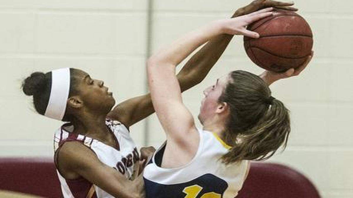 Golden Valley’s Kayla<137>✔<137> Commons<137>✔<137>, left, blocks the shot of Elk Grove’s Sidney<137>✔<137> Kilbride<137>✔<137> during their Sac-Joaquin Section Division II<137>✔<137> playoff game. Commons and Kilbride each finished with six<137>✔<137> points.<252><252>