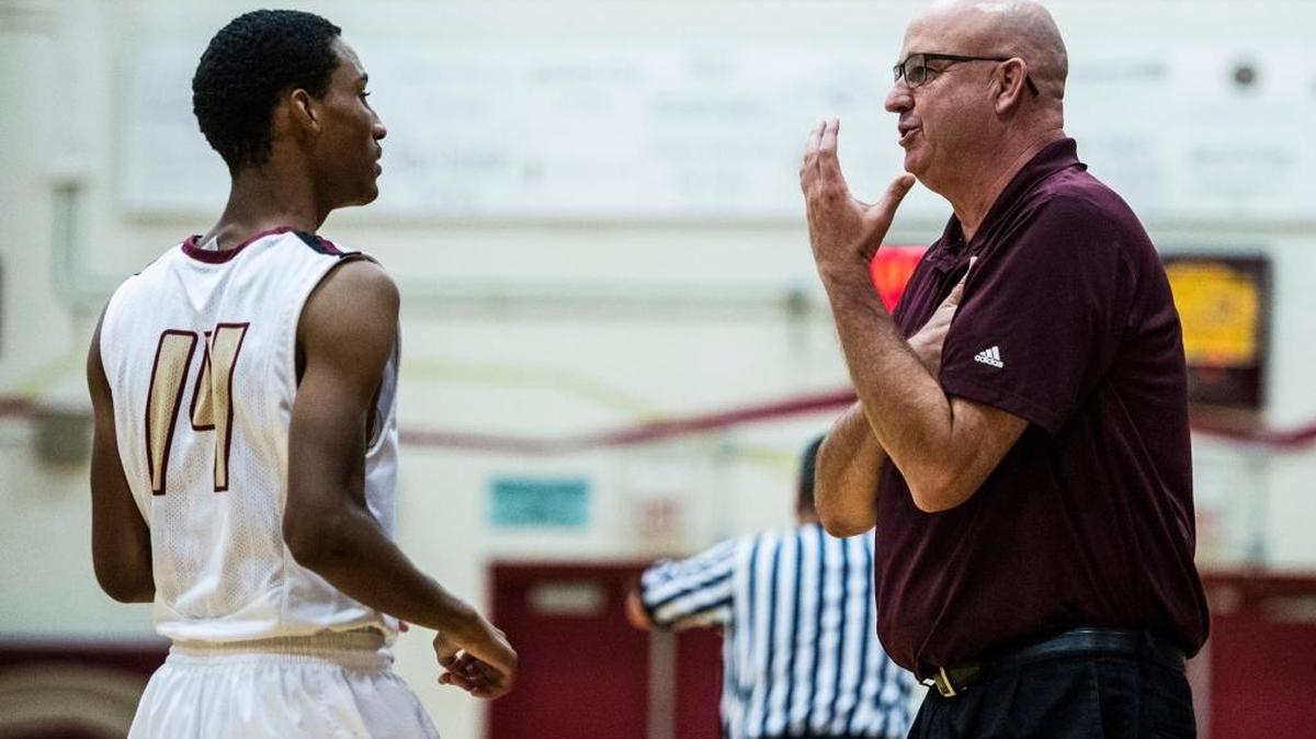 Golden Valley head coach Keith Hunter, right, speaks Devon Martinez during a game in 2015. Hunter is closing in on career win number 400 after picking up win No. 395 on Tuesday night against Sierra of Manteca.