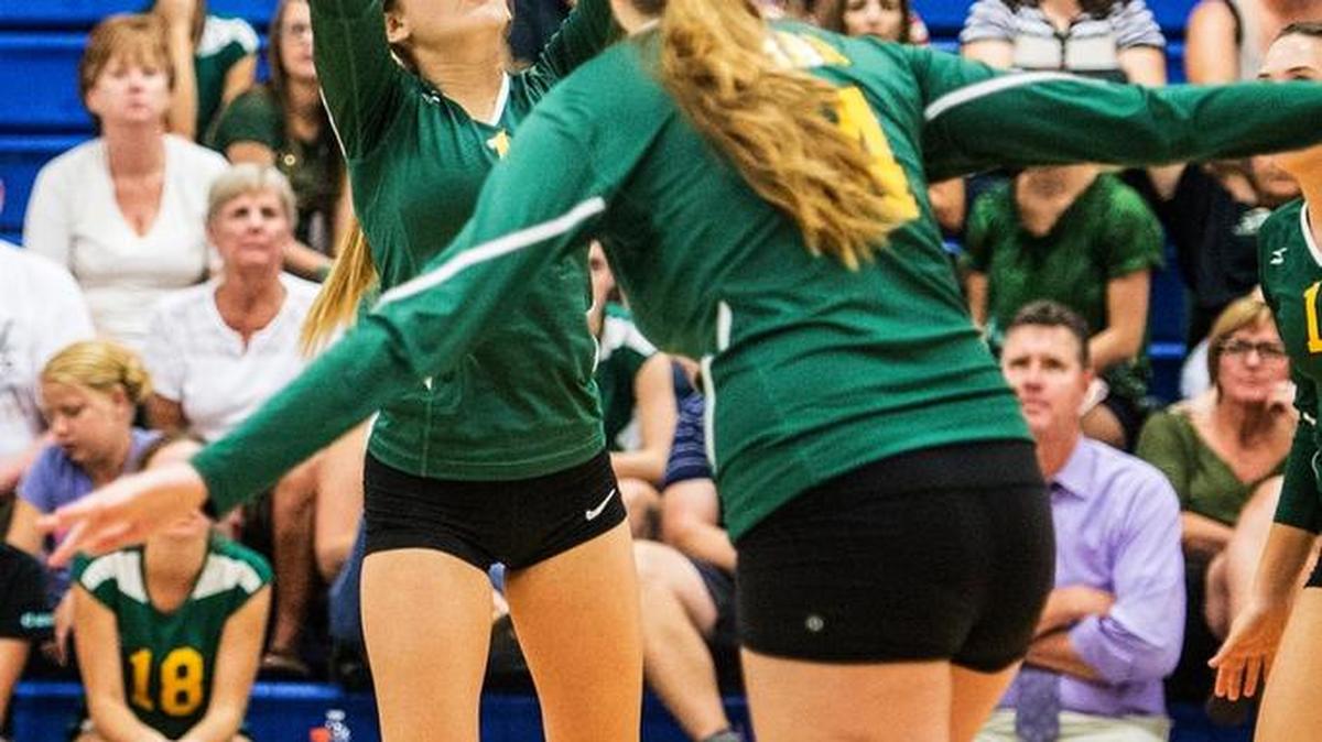 Hilmar sophomore Hannah Pearce (1) sets the ball during a match against Atwater at Atwater High School in Atwater, Calif., Thursday, Sept. 10, 2015. The Yellowjackets beat the Falcons 3-0.