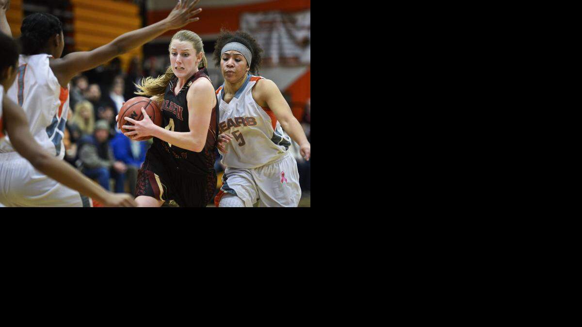 
Golden Valley junior Stephanie Moore (4) drives the lane during a game against Merced at Merced High School on Thursday.
