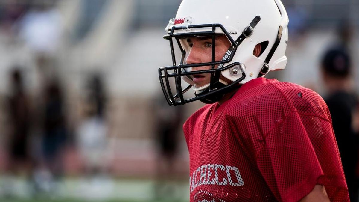 Pacheco quarterback Aric Barton looks on during a scrimmage at Golden Valley High School in Merced, Calif., on Saturday, Aug. 19, 2017.