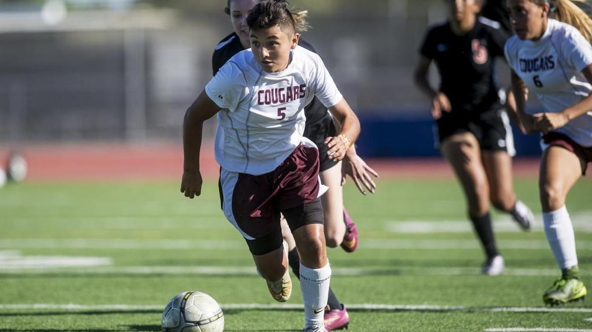 Golden Valley sophomore Jaylin Meza (5) runs along the sideline during a game against Merced at Golden Valley High School in Merced, Calif., Tuesday, April 5, 2016.