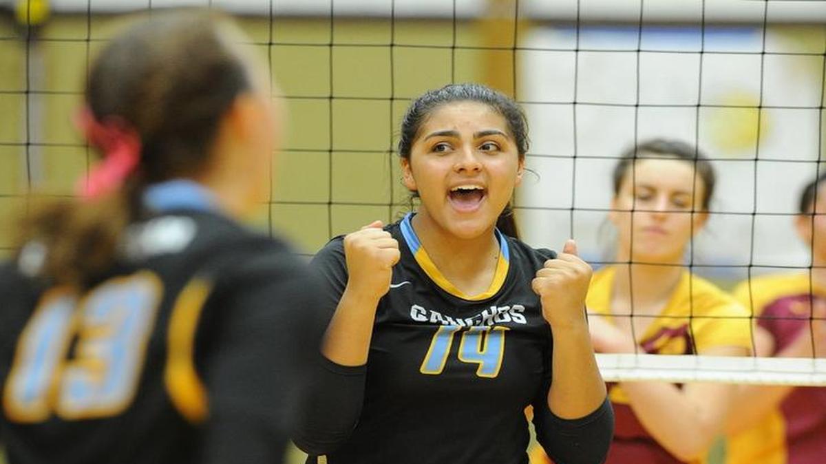 
El Capitan’s Ariana Johnson (14) celebrates a point during the Gauchos 3-1 win over Los Banos on Friday night at Los Banos High.
