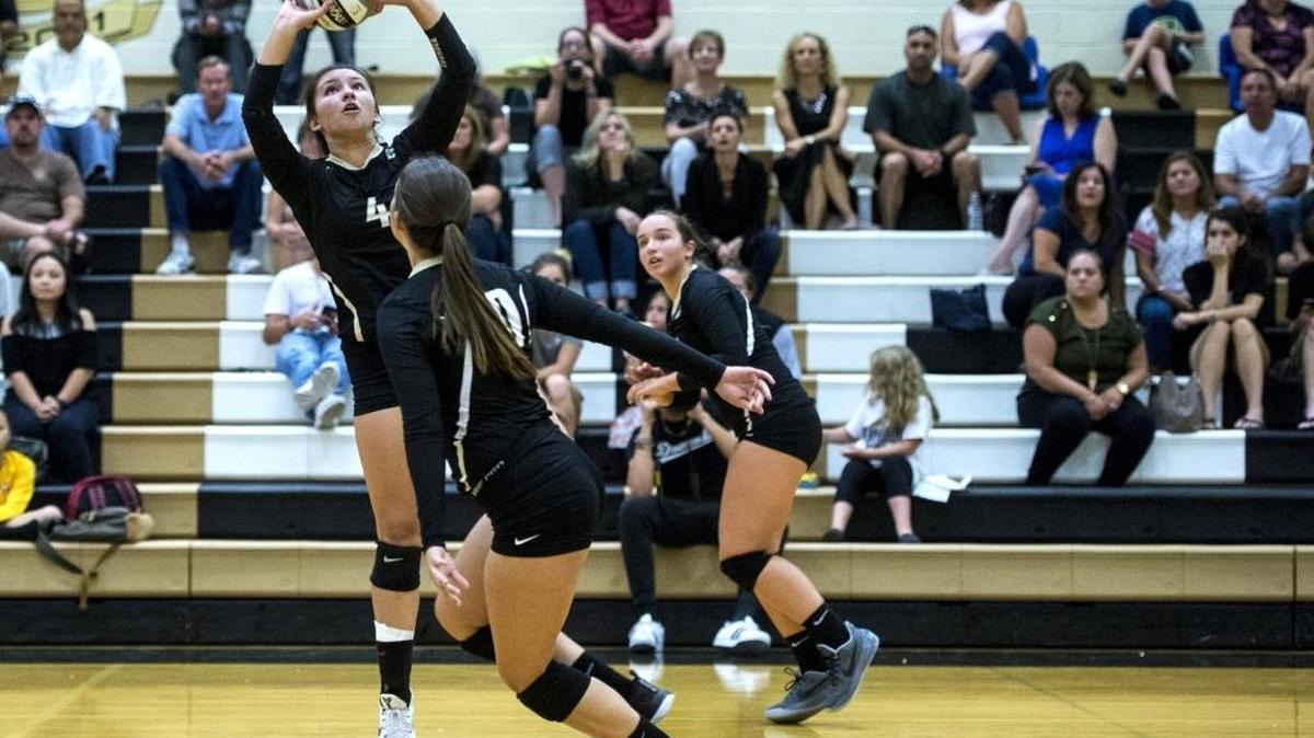 Buhach Colony sophomore Miranda Baptista (4) sets the ball during a match against Golden Valley at Buhach Colony High School in Atwater, Calif., on Tuesday, Sept. 12, 2017. The Thunder beat the Cougars 3-0.
