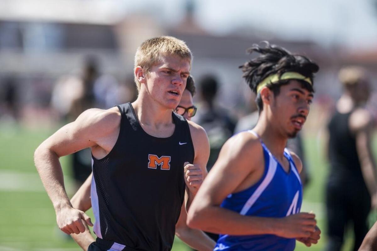 Merced's John Hagerman competes in the 1600-meter race during the CCC Center Meet at Golden Valley High School in Merced, Calif., on Wednesday, March 28, 2018.