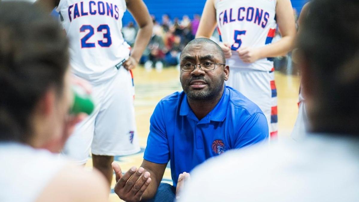 Atwater head coach JR Davis speaks to his team during a game against Turlock last season. Davis picked up his 100th career win on Thursday night with a victory over El Capitan.