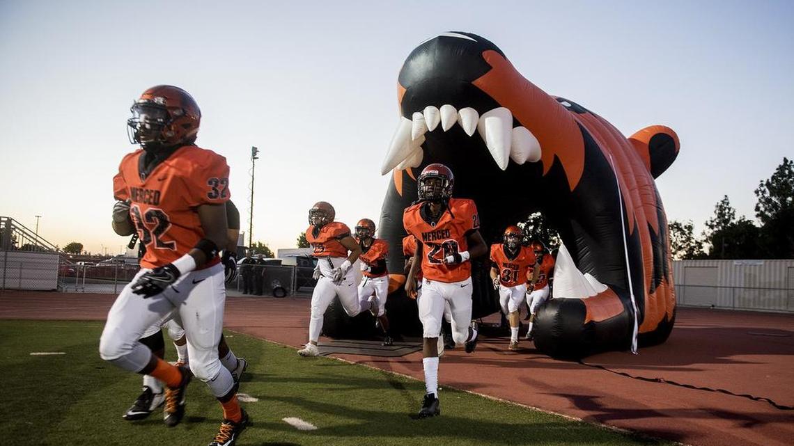 The Merced Bears take the field during a game against Madera at Veterans Stadium on the campus of Golden Valley High School in Merced, Calif., on Friday, Sept. 7, 2018. The Bears beat the Coyotes 63-35. 