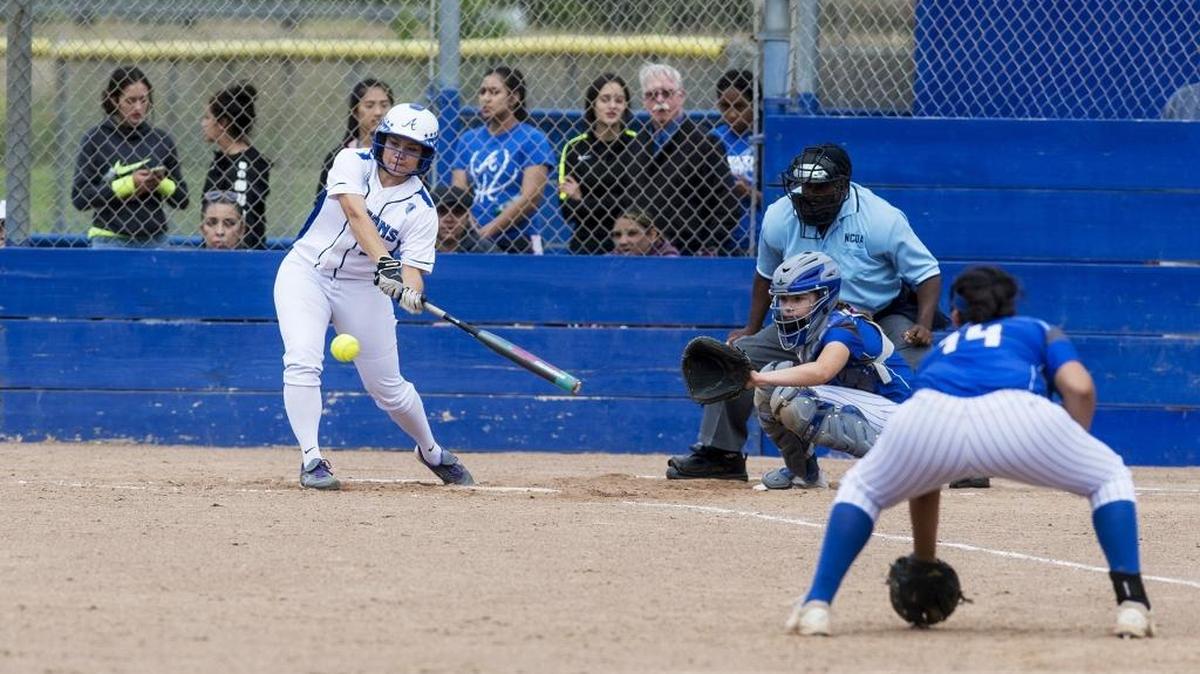 Atwater junior Katie Bettis (3) flies out to right field during a Sac-Joaquin Section Division II playoff game against Bear Creek at Atwater High School in Atwater, Calif., on Tuesday, May 16, 2017. The Bruins beat the Falcons 3-0.