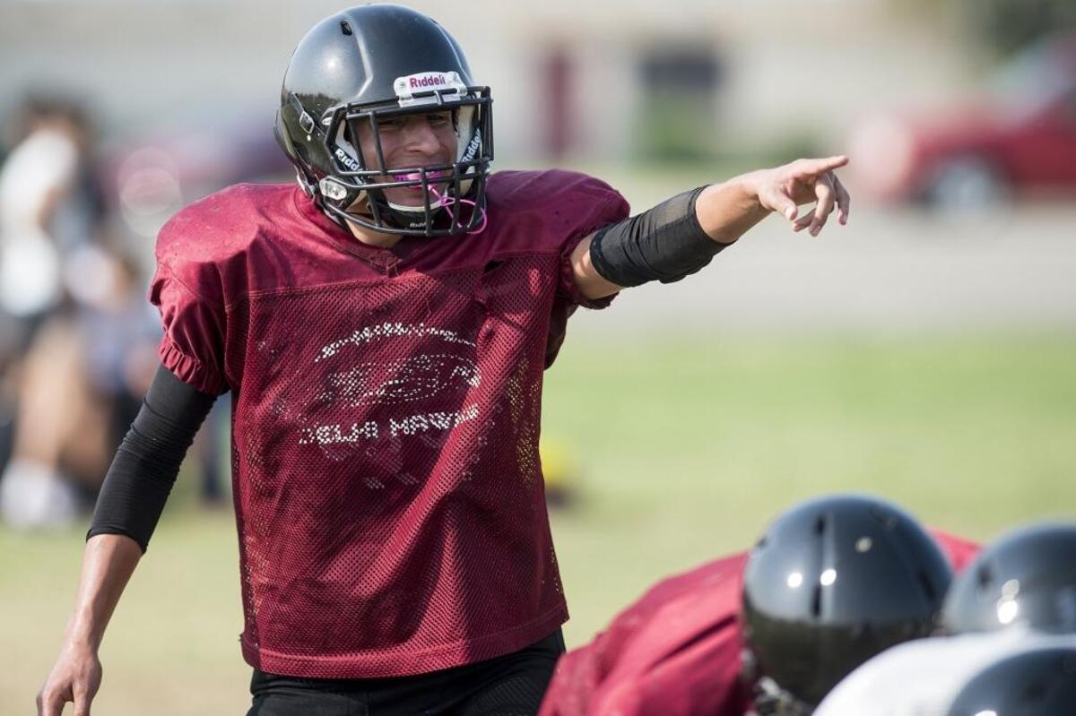 Delhi’s Kevin Nieto points to the offense during football practice at Delhi High School in Delhi, Calif., on Thursday, Aug. 9, 2018.