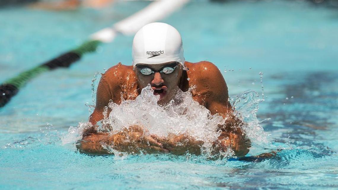 Merced High School's Abraham Santana swims the breats stroke during the 200 yard medley relay at the Central California Conference Swimming Championship at Pitman High School in Turlock, Calif., Saturday, April 30, 2016.